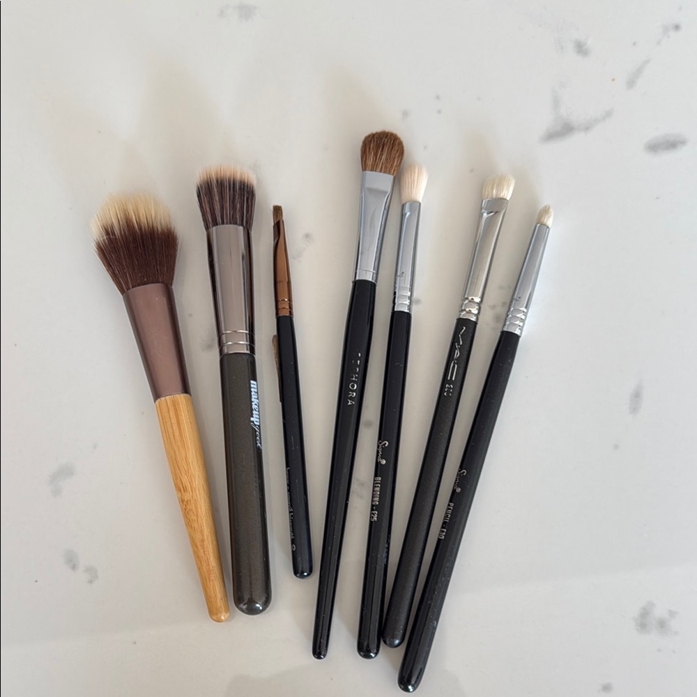Assorted makeup brushes from Mac, Sephora, Sigma